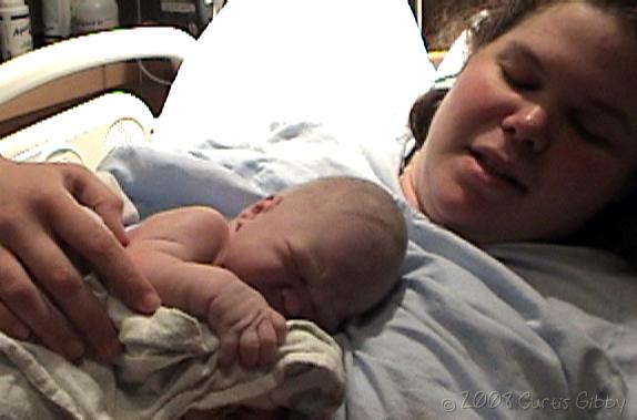 Labor and Delivery - Nathan rests on Sarah's chest right after birth