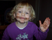 View - Messy Audrey eating chocolate cake batter
