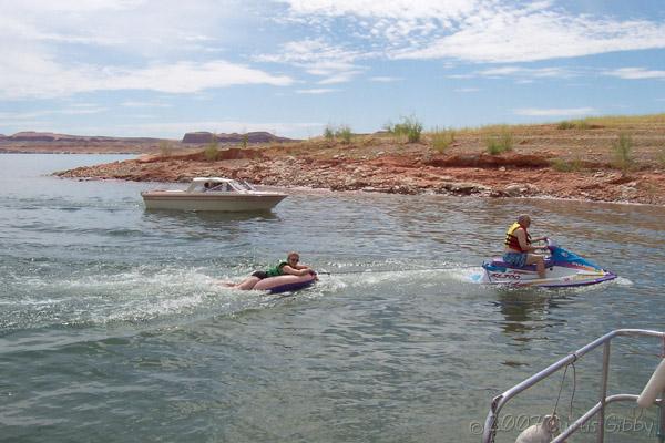 Lake Powell - August 2007 - Dad on the jetski pulling Mom on the tube