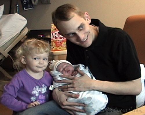 Labor and Delivery - Curtis, Audrey and Nathan pose in the hospital room