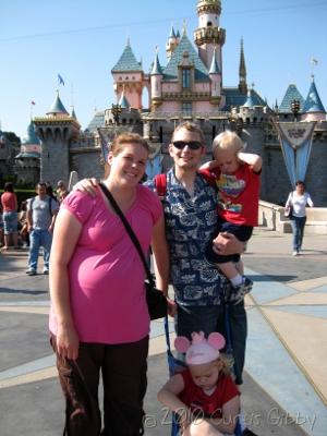 Disneyland 2010 - The Gibby Family in front of Sleeping Beauty's Castle