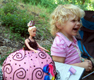 View - 3-year-old Audrey with her princess birthday cake